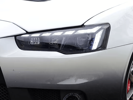 Оптика передняя, фары на Mitsubishi Lancer